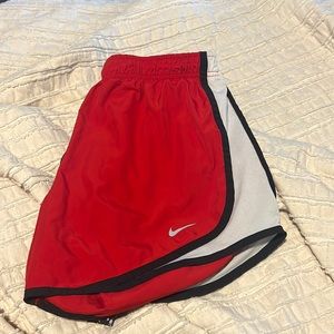 Red running shorts nike